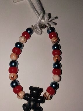 Beaded Bear Pendant Bracelet in Black, Red, Blue, and Cream